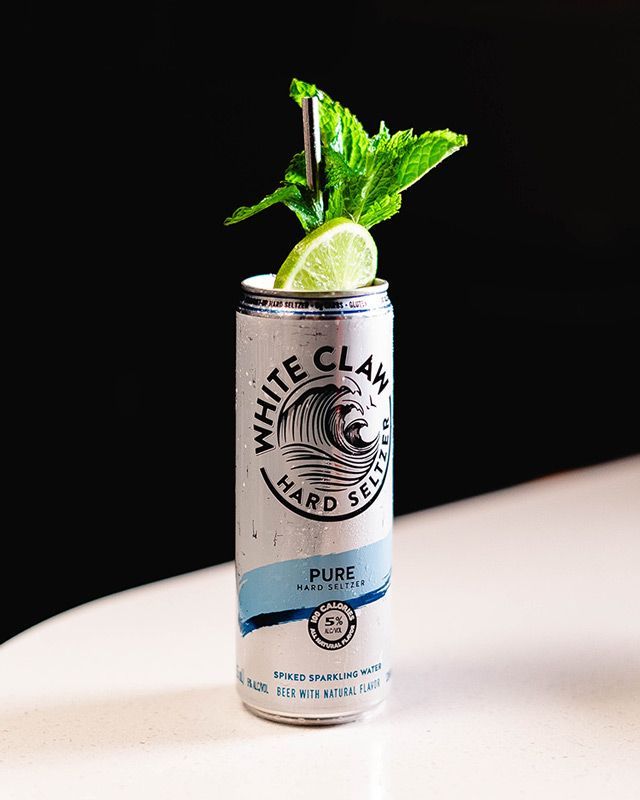 white claw mojito with a mint and lime garnish